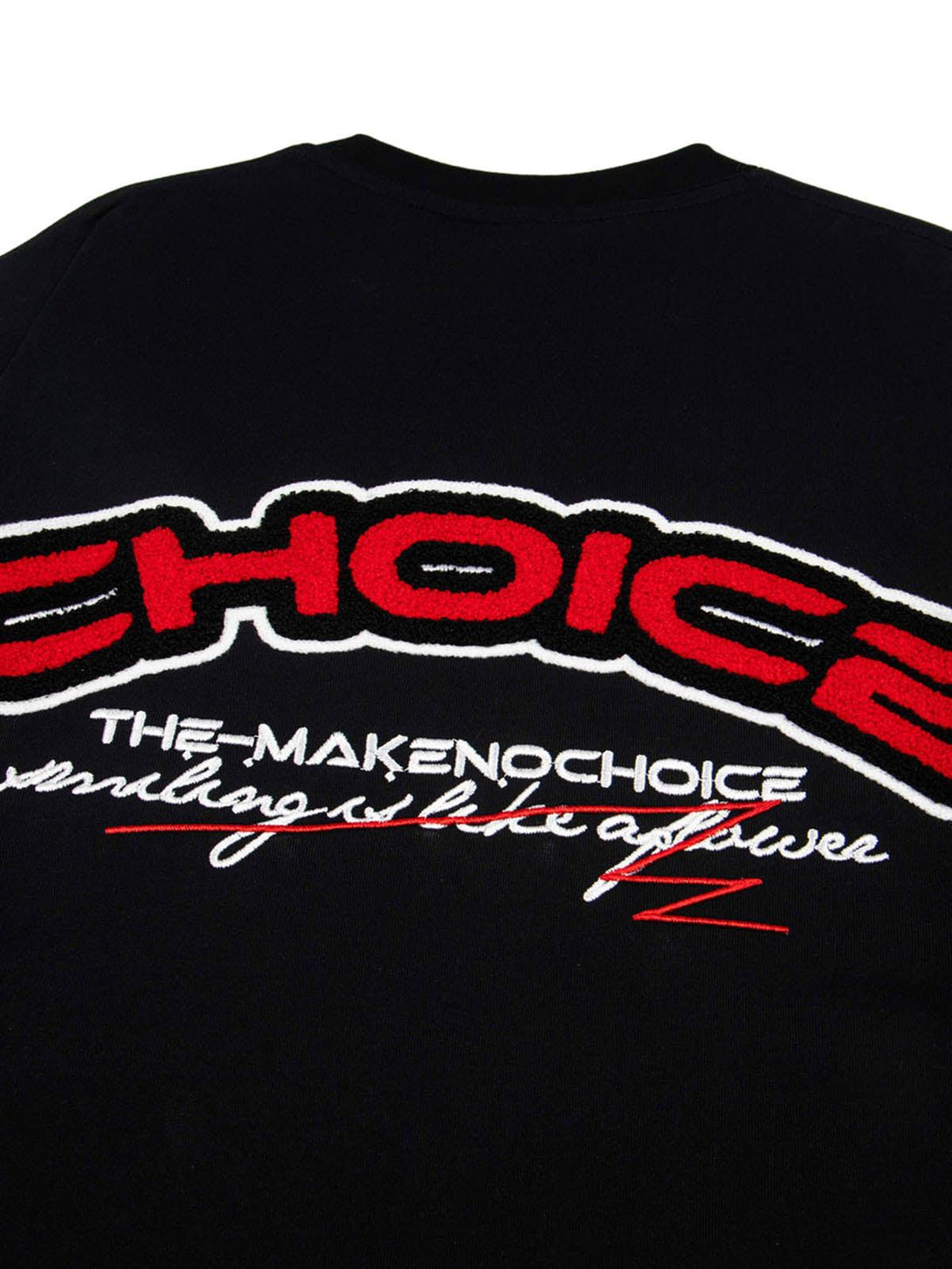 Back view of TALISHKO T-shirt featuring bold red embroidery in a retro motorcycle design.
