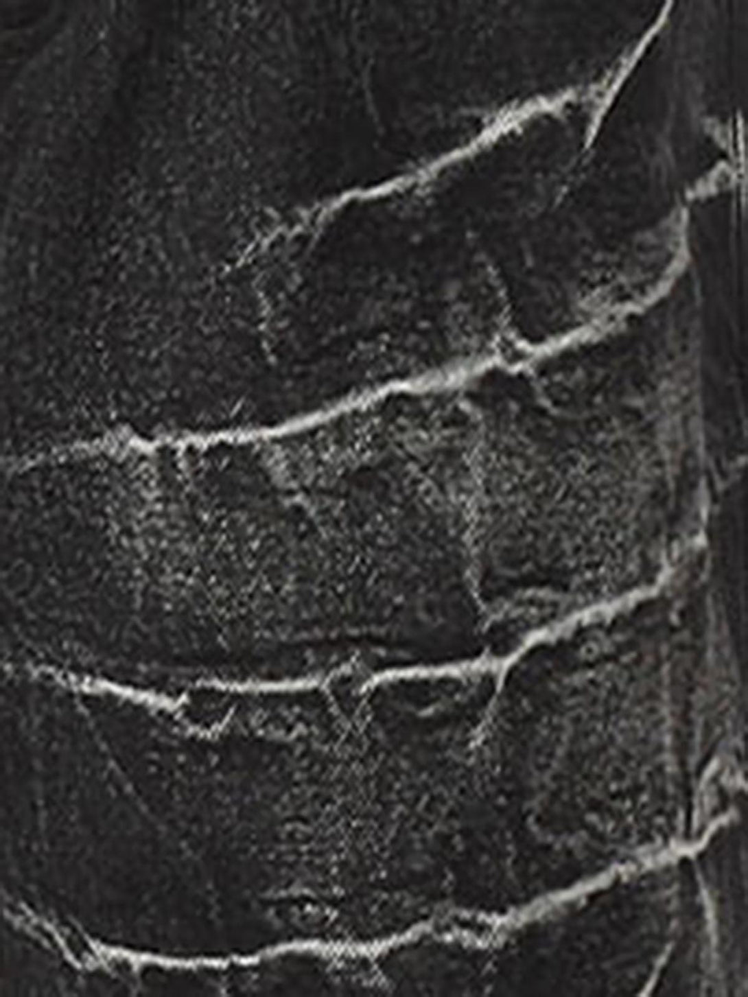 Intricate look at the washed texture of TALISHKO retro straight jeans, highlighting vintage style.