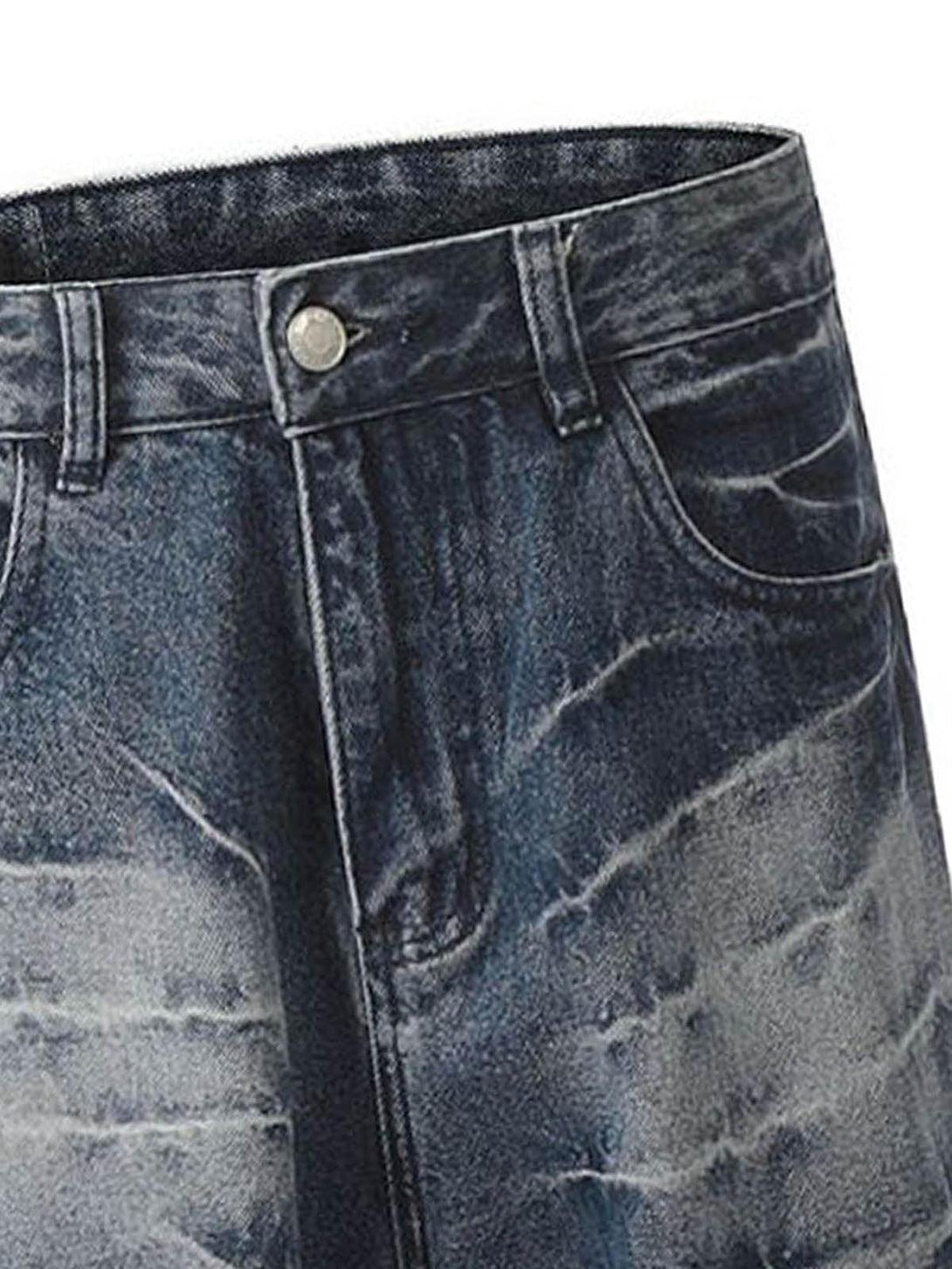 Detailed view of TALISHKO retro neutral washed jeans, highlighting unique texture and style.