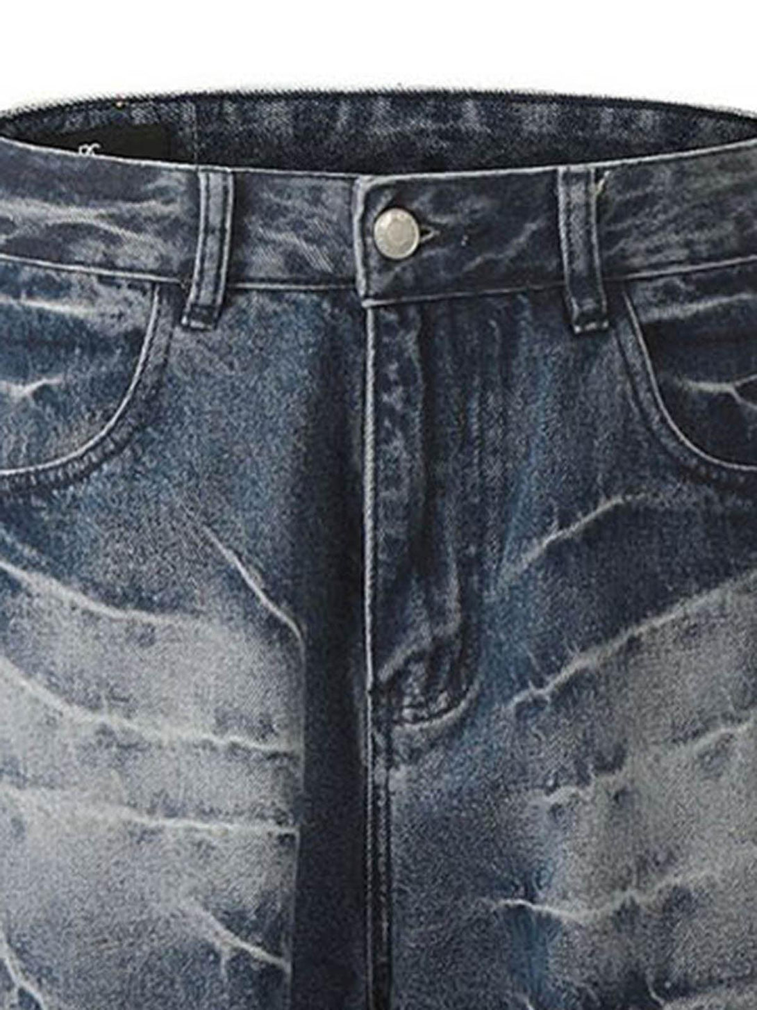 A tight crop highlighting the washed texture of TALISHKO retro straight jeans for a vintage vibe.