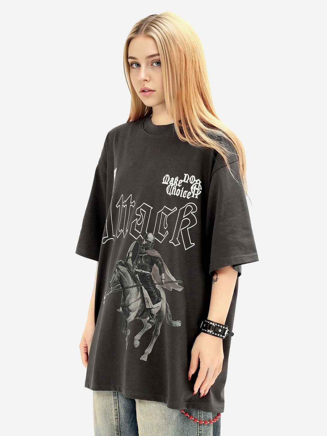 Model wearing a TALISHKO T-shirt with a retro knight print, capturing a casual, vintage vibe.