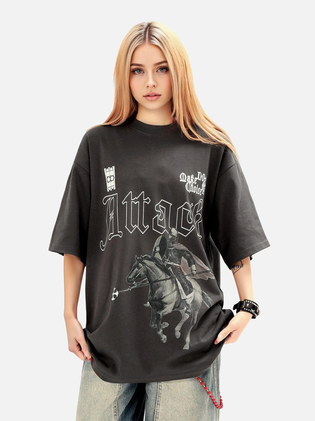 Model wearing a retro knight print T-shirt by TALISHKO, showcasing a relaxed, vintage style.