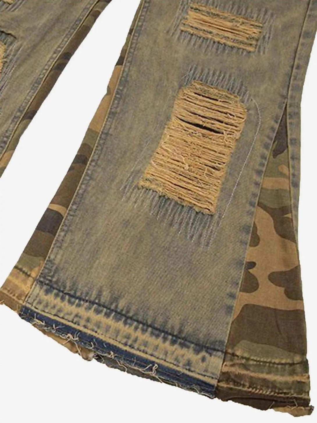Intricate look at TALISHKO's retro flared jeans with distressed patchwork and camouflage details.
