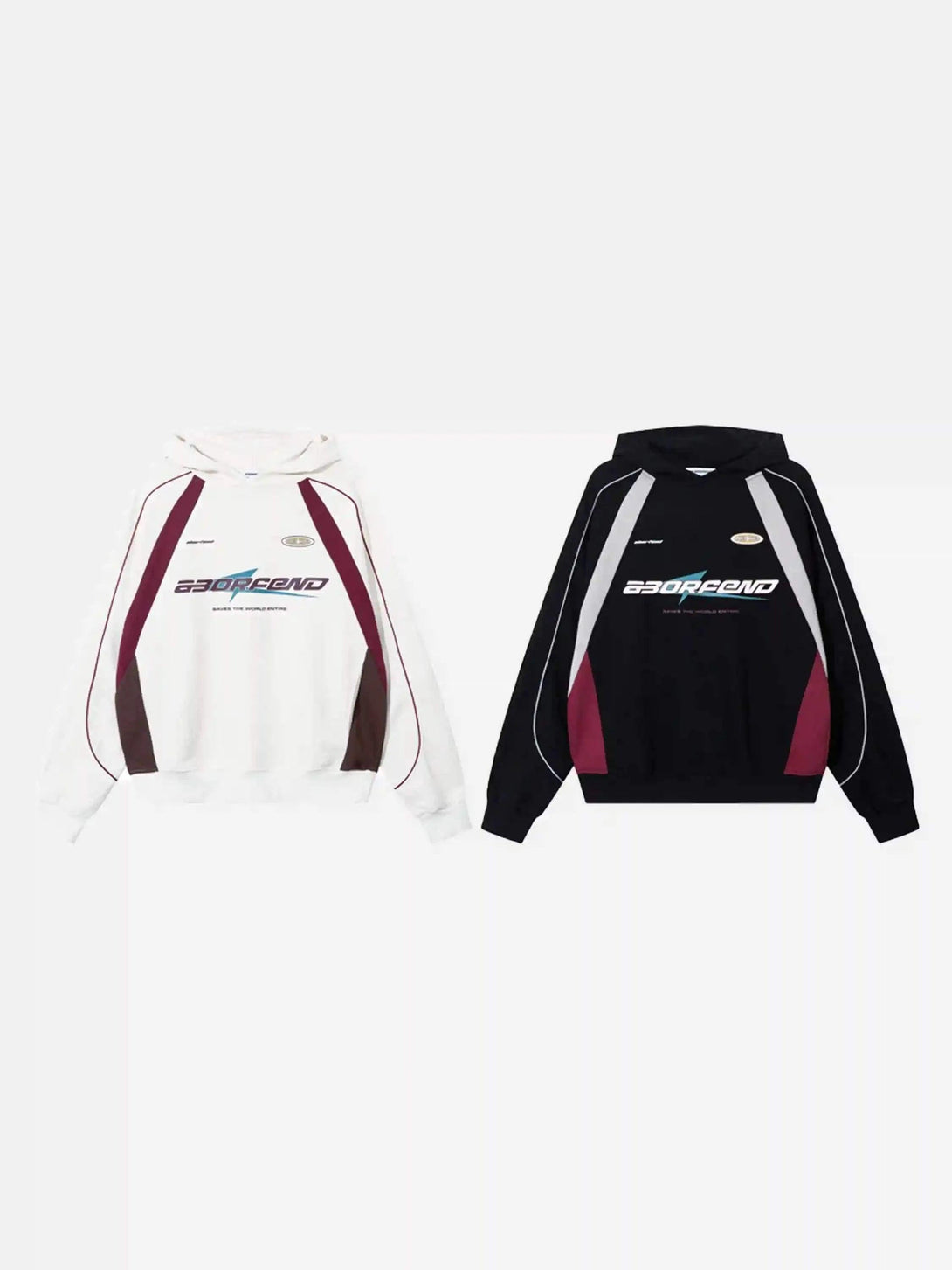 Two TALISHKO retro patchwork hoodies in contrasting black and white, highlighting hip-hop style.