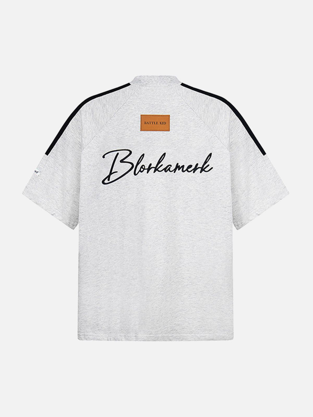 Back view of gray retro patchwork t-shirt by TALISHKO featuring unique lettering and patch detail.