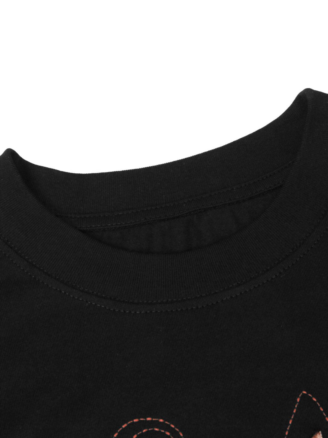 A close-up of the neckline on a black TALISHKO T-shirt, highlighting quality stitching.