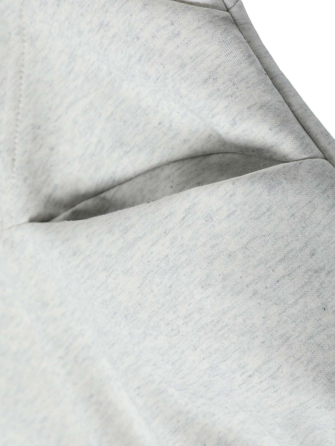 Detailed fabric and stitching of TALISHKO's hooded sweatshirt, highlighting craftsmanship.