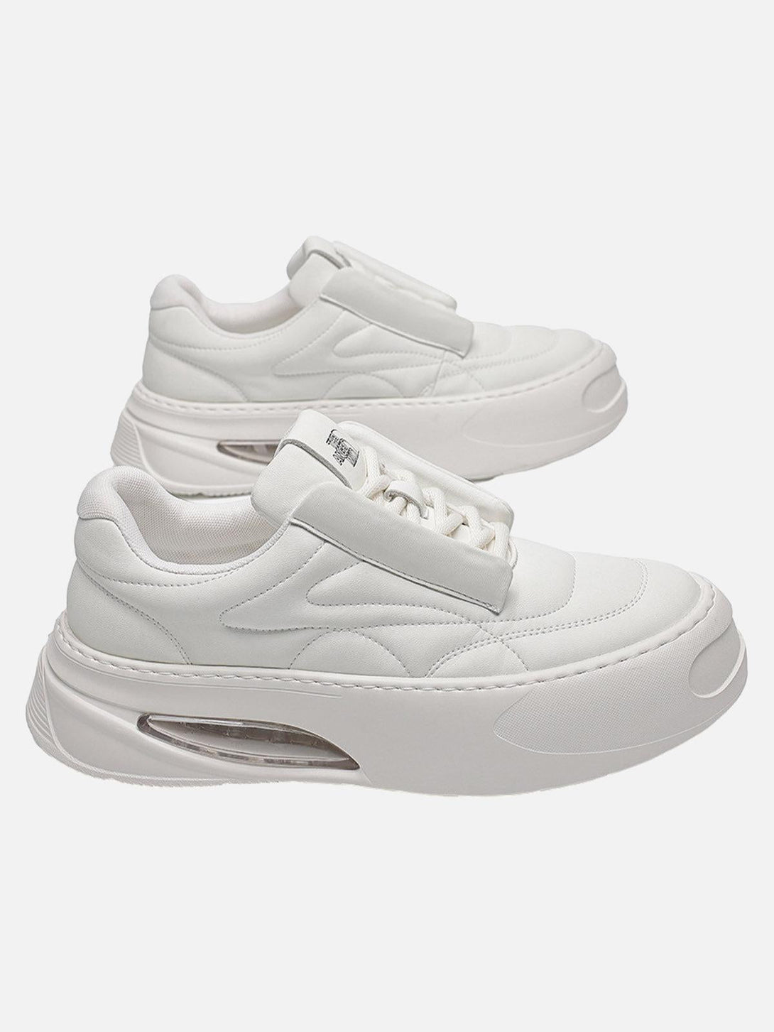 Side angle of TALISHKO retro platform skate shoes in white, featuring a sleek, modern design.