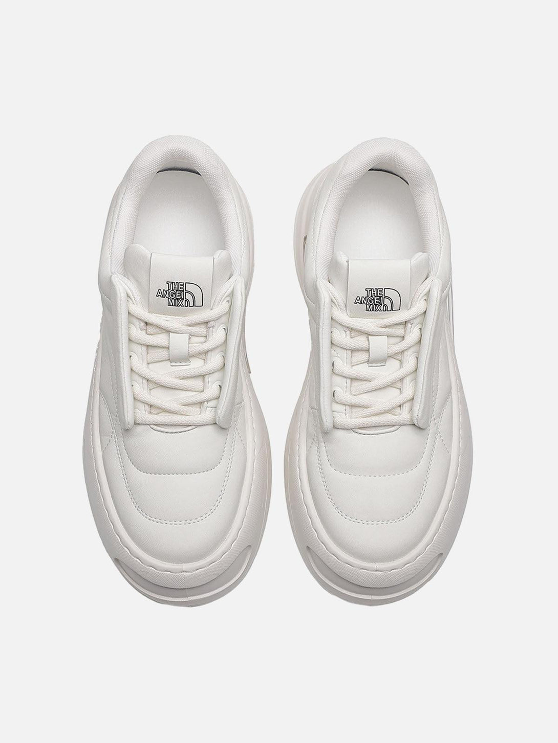 Top-down view of white retro platform skate shoes by TALISHKO, featuring a sleek, minimal design.