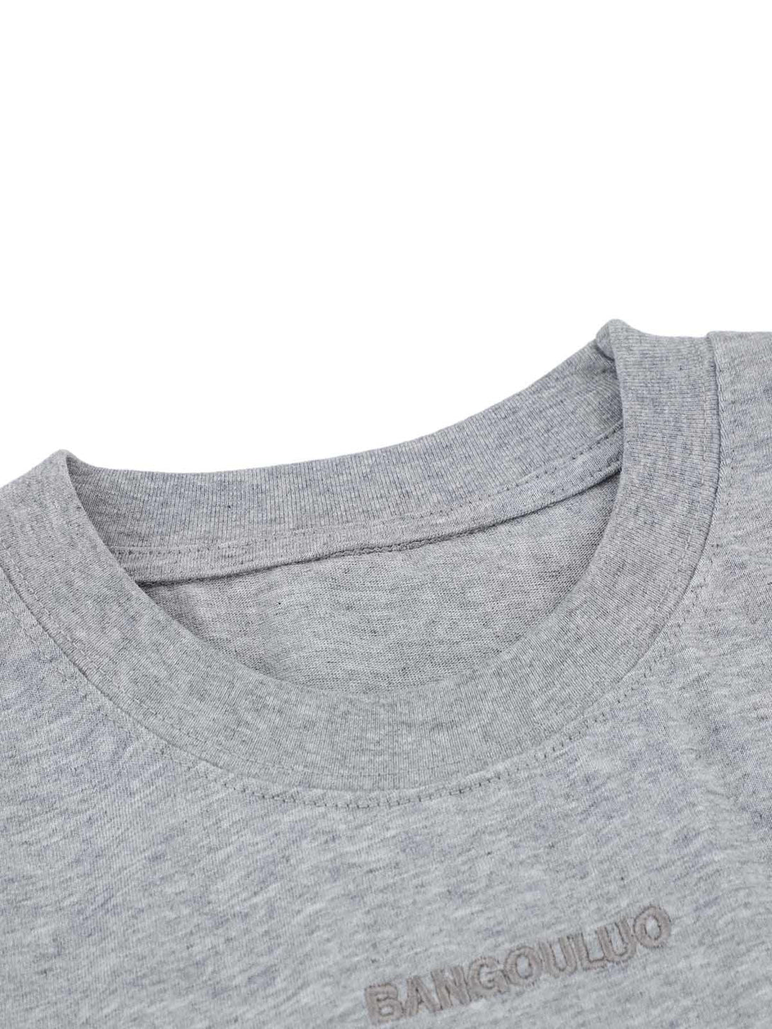 Detailed fabric and stitching of a gray retro quilted T-shirt by TALISHKO.