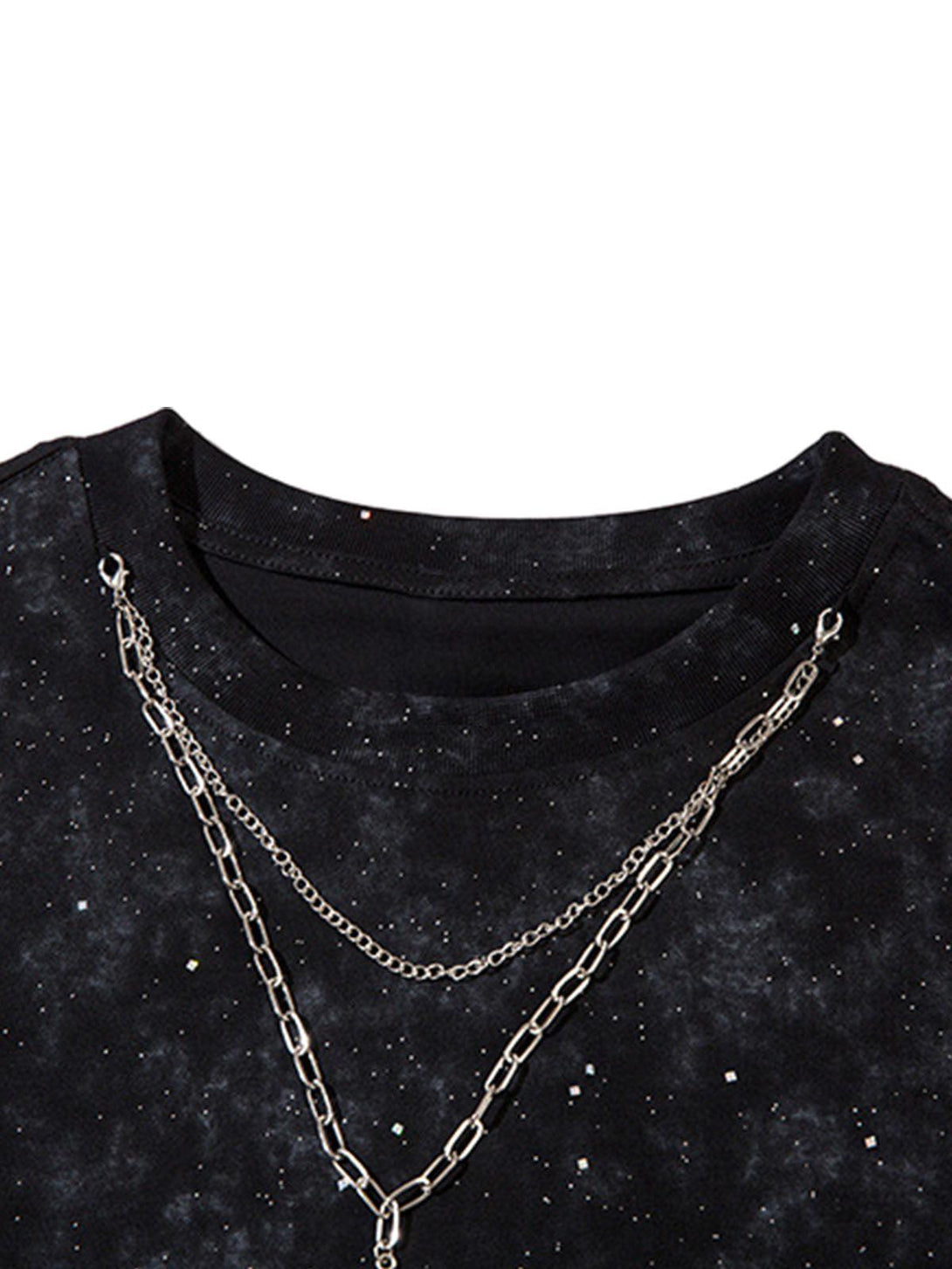 Chain detail and galaxy-inspired pattern on TALISHKO vest fabric, showcasing unique texture.