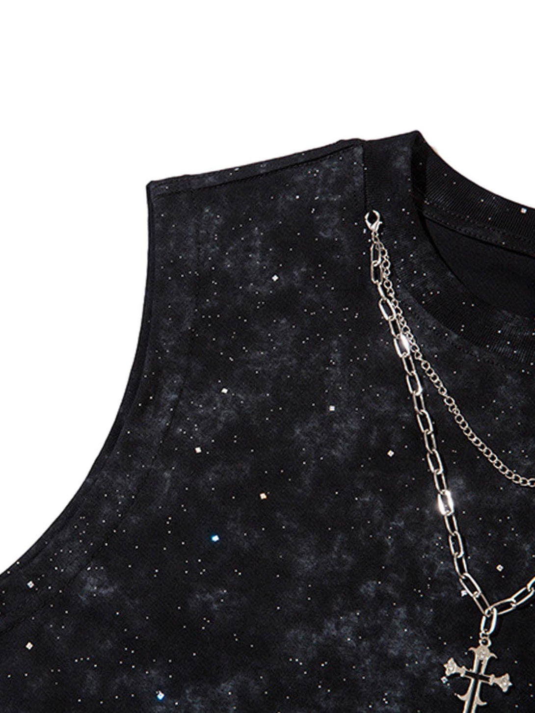 Intricate look at the galaxy pattern and rhinestone cross chain on TALISHKO's vest.