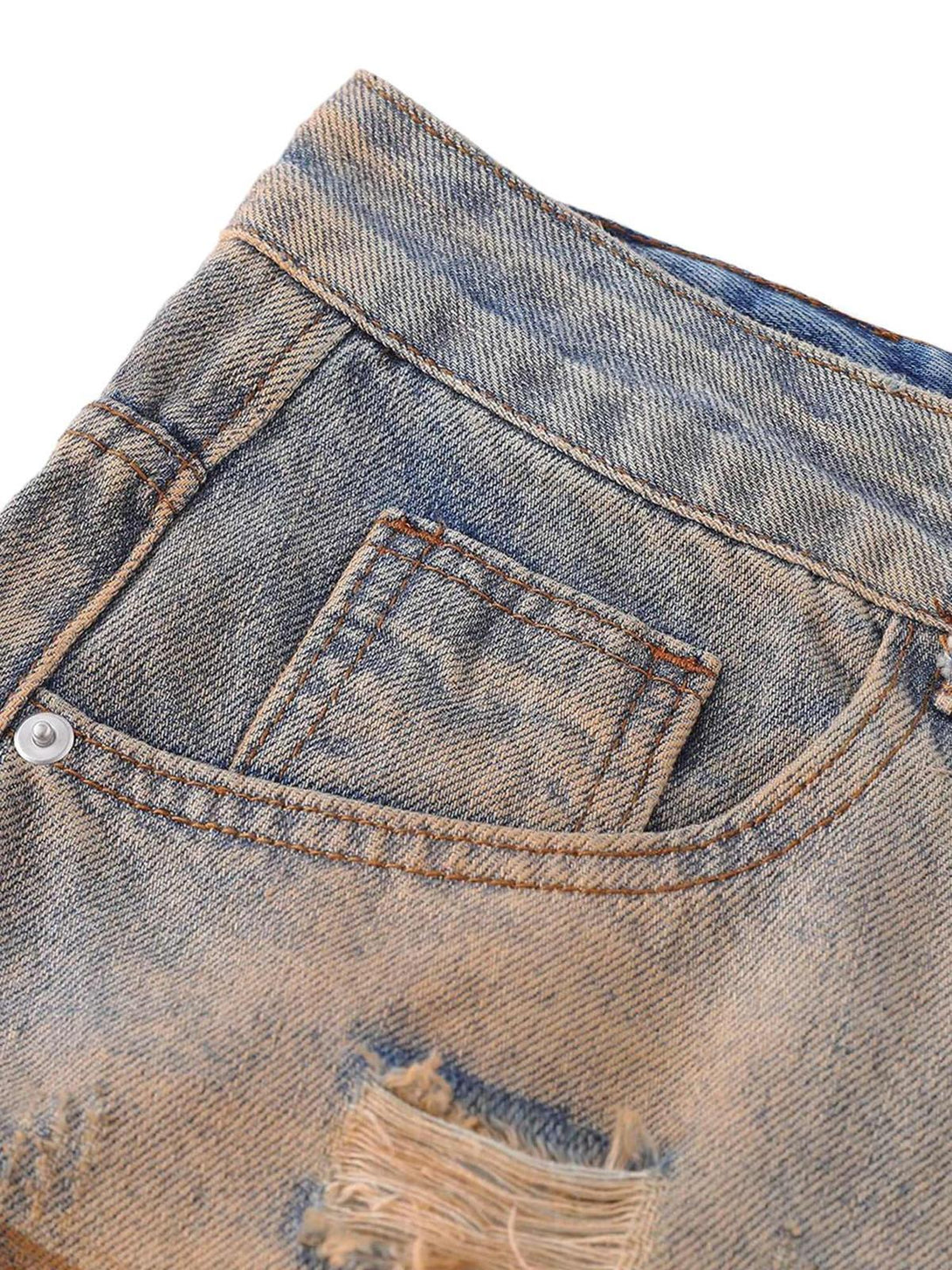 Close-up of TALISHKO's retro hip-hop jeans, showcasing distressed pocket detail and patina.