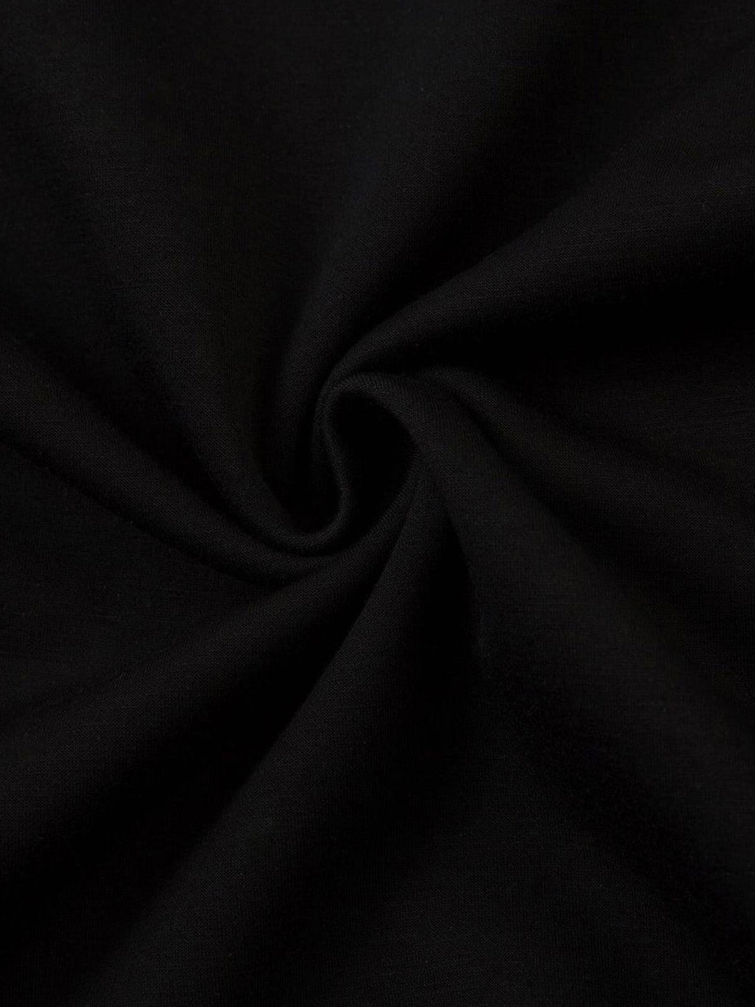 Detailed fabric texture in black, showcasing TALISHKO's retro pleated T-shirt design.