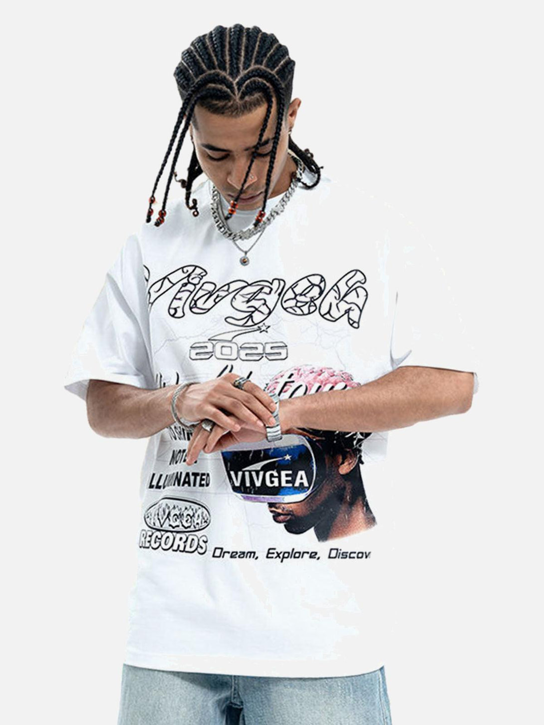 Model in white retro sci-fi graphic T-shirt by TALISHKO, featuring bold and dynamic visuals.