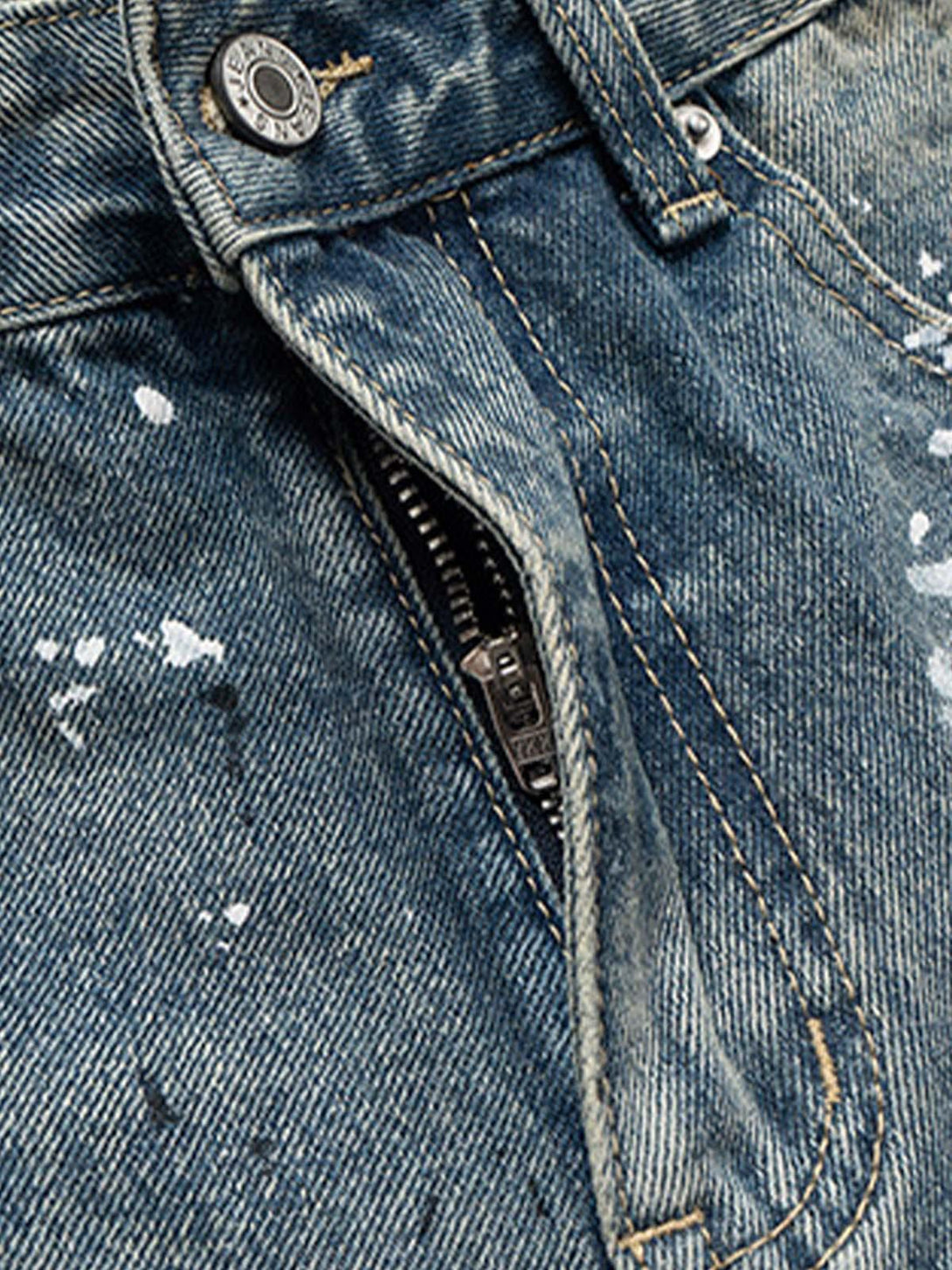Detailed look at TALISHKO's denim shorts zipper and stitching, showcasing a retro vibe.