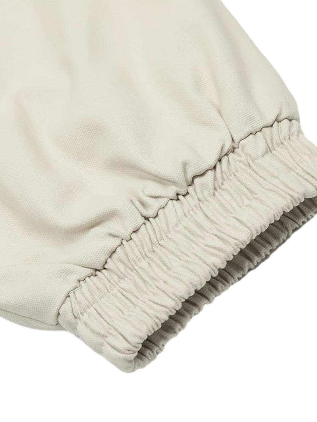 Elastic cuff detail on TALISHKO retro stand collar casual jacket, highlighting texture.