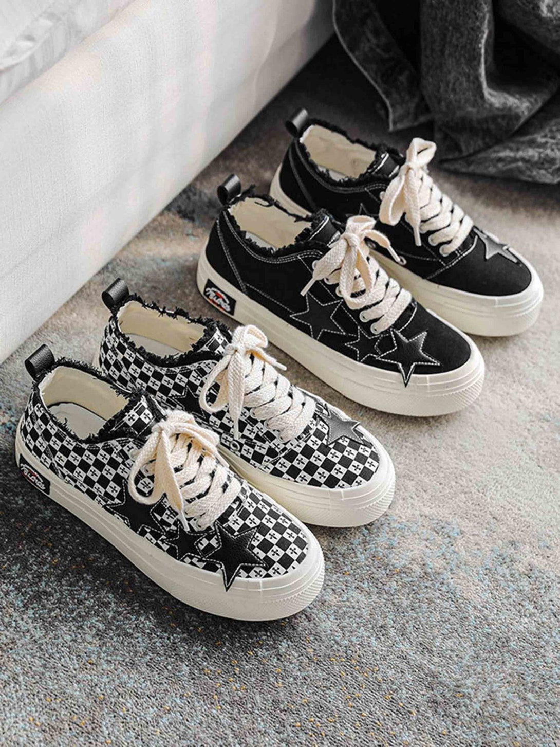 Retro star canvas shoes by TALISHKO, featuring stylish black and white patterns and star accents.