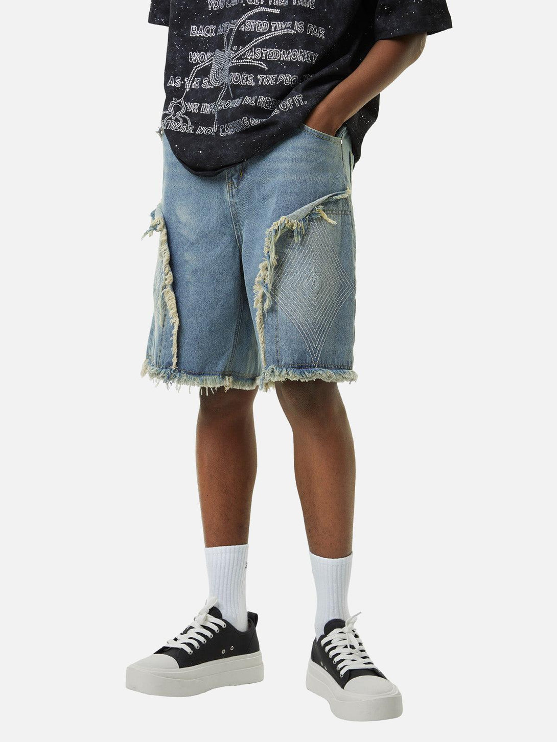 Retro-inspired TALISHKO shorts with frayed edges and diamond embroidery, perfect for casual wear.