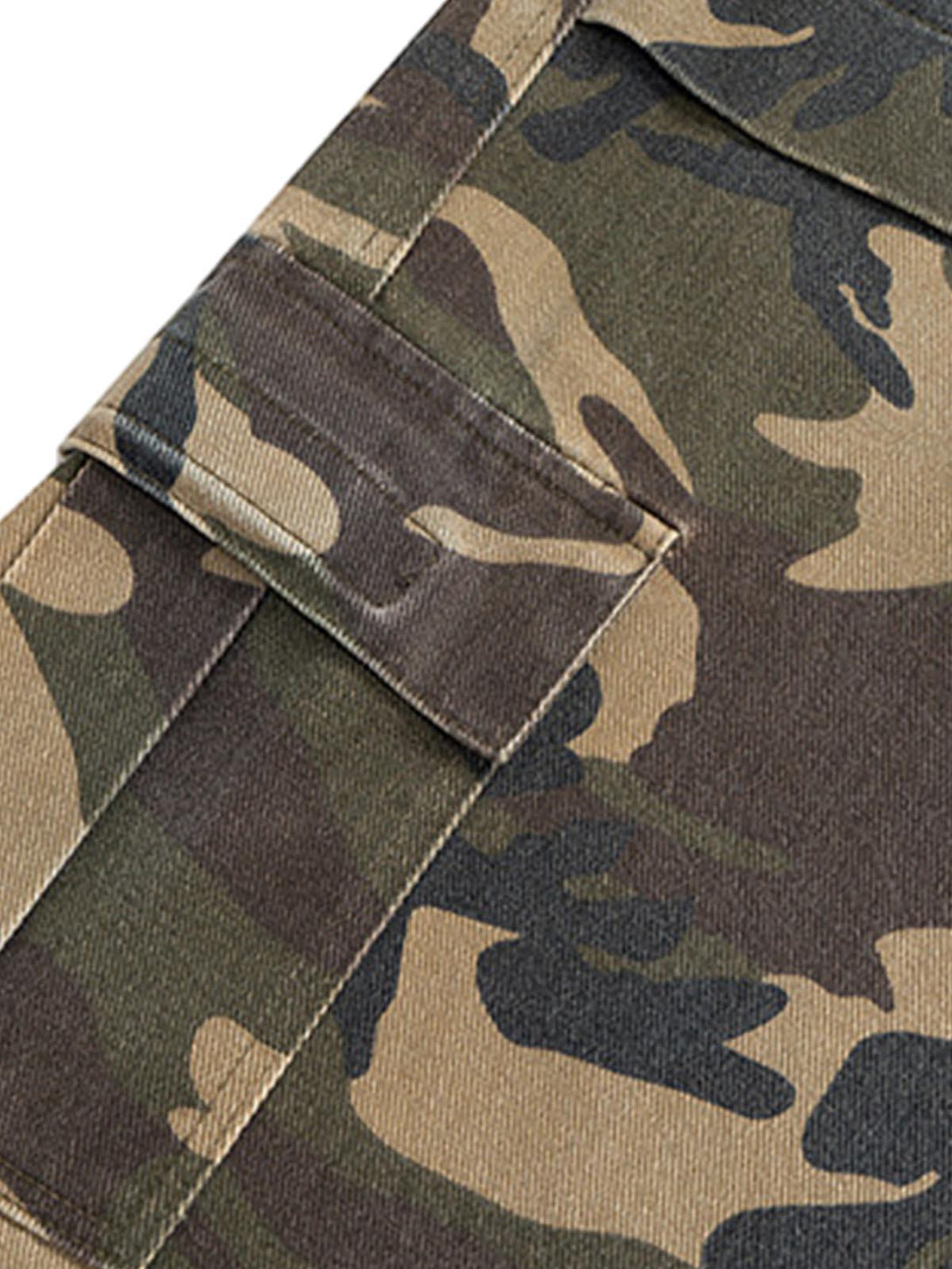 Focusing on the camouflage pattern of TALISHKO's jeans, highlighting detailed pocket stitching.