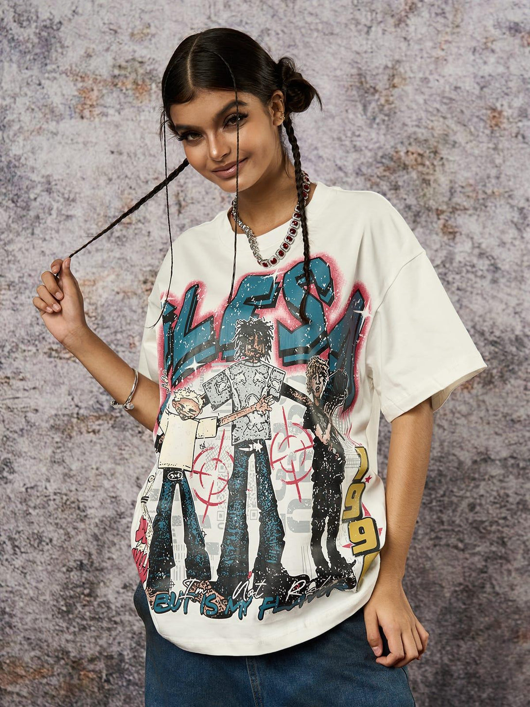Model styled in a TALISHKO Retro Street GLESA graphic T-shirt, showcasing vibrant artwork.