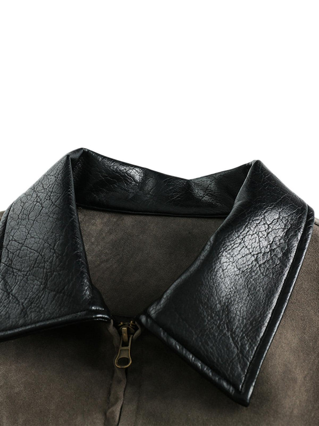 A close-up of the TALISHKO retro suede motorcycle jacket collar, highlighting its unique texture.