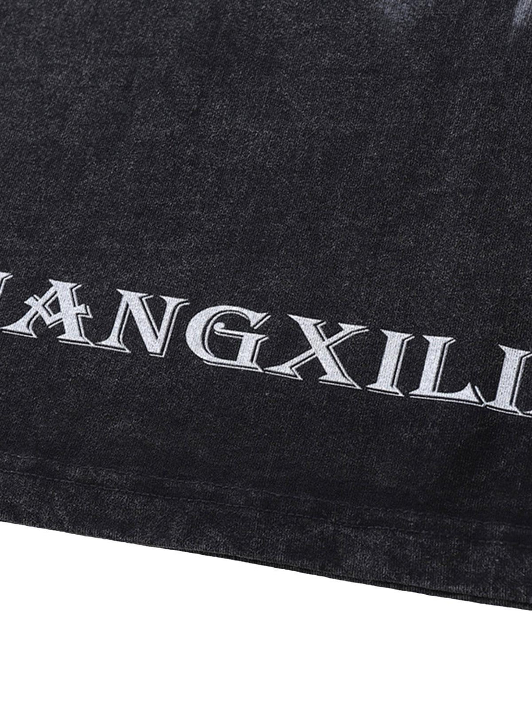 Close-up of the distressed texture on the retro washed T-shirt by TALISHKO.