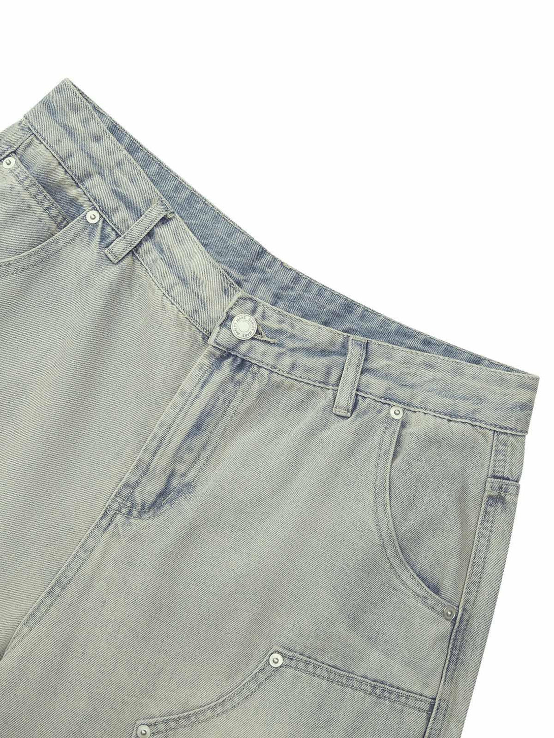 A close-up of TALISHKO retro washed hip-hop shorts, highlighting front pockets and texture.