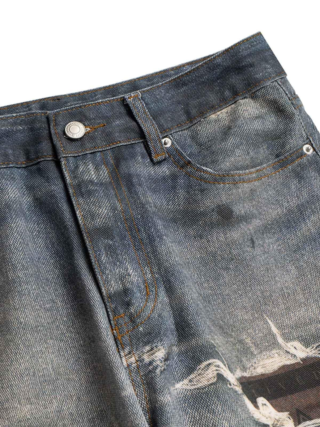 Focusing on the intricate distressed details of TALISHKO's retro washed flare jeans.