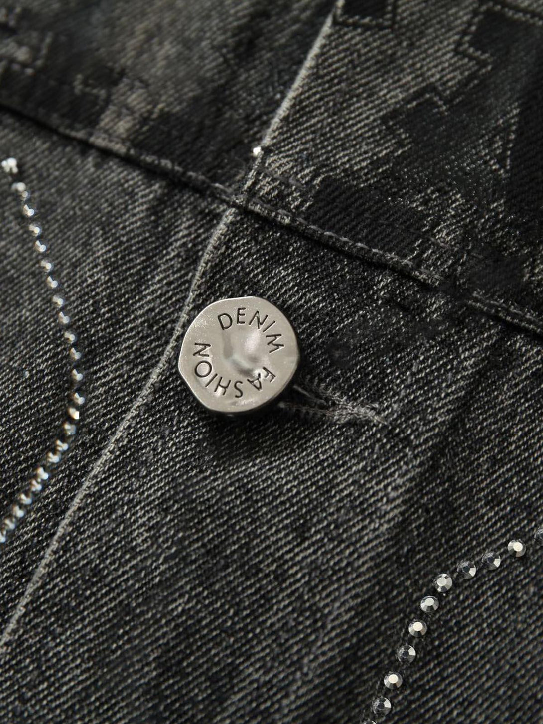Detailed fabric and stitching on TALISHKO's retro denim vest, highlighting rivet accents.