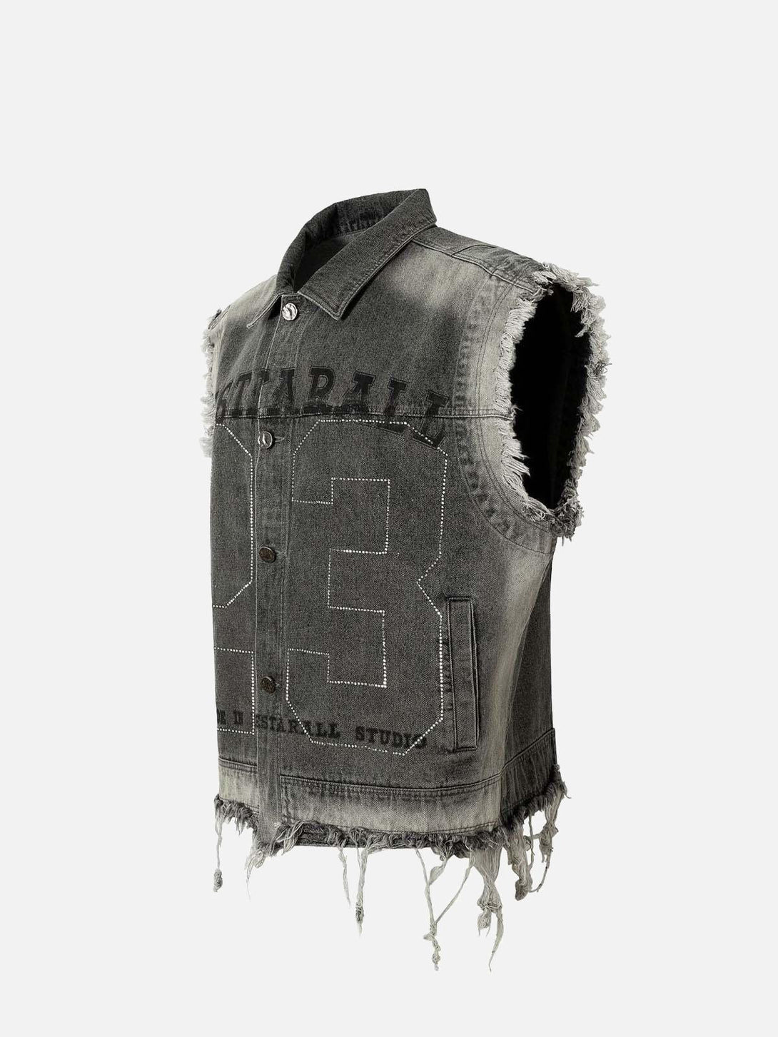 Frayed denim vest with rivet details by TALISHKO, showcasing a rugged retro aesthetic.