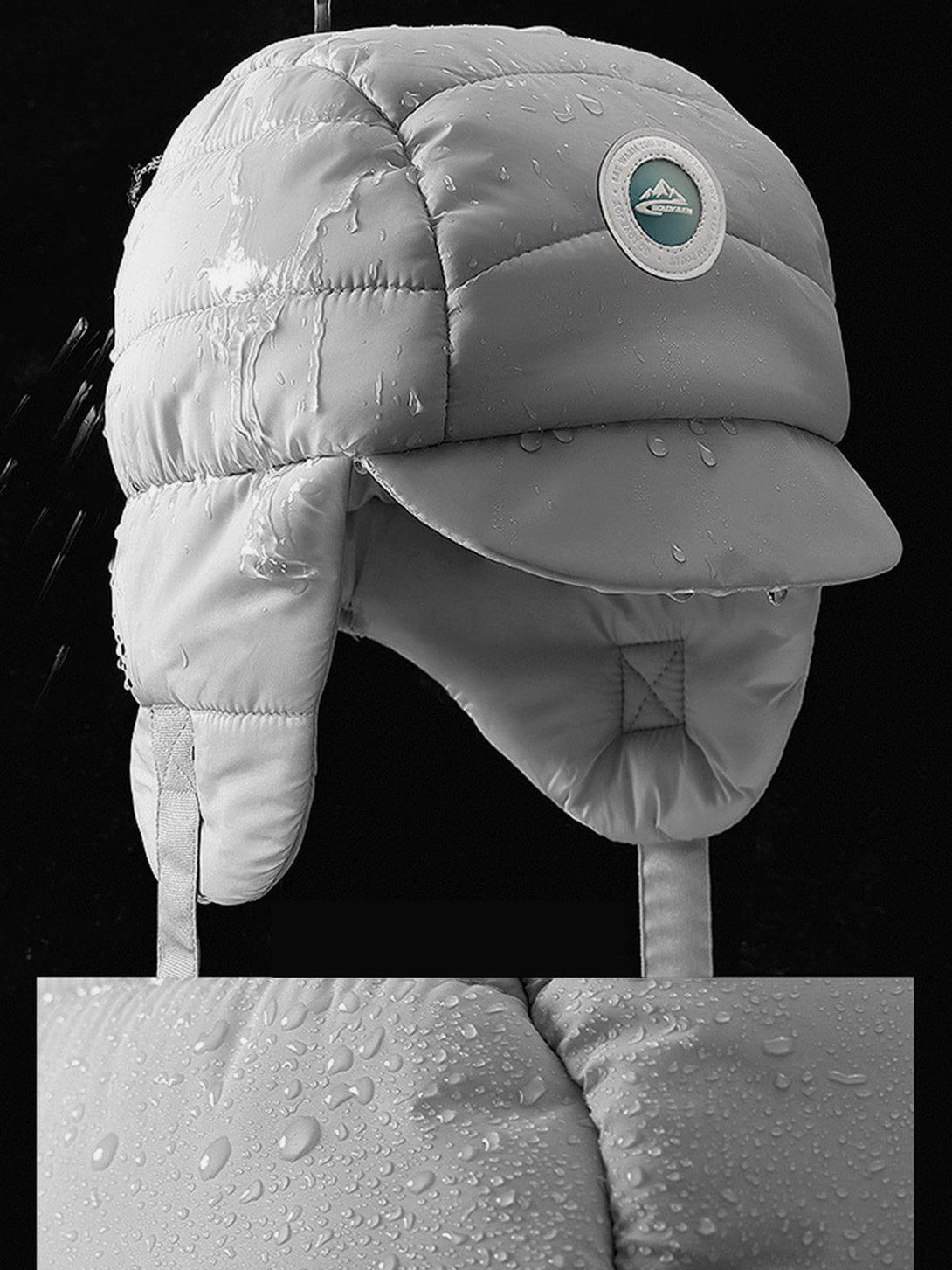 A detailed view of a water-resistant ear protection hat by TALISHKO, showcasing quilted texture.