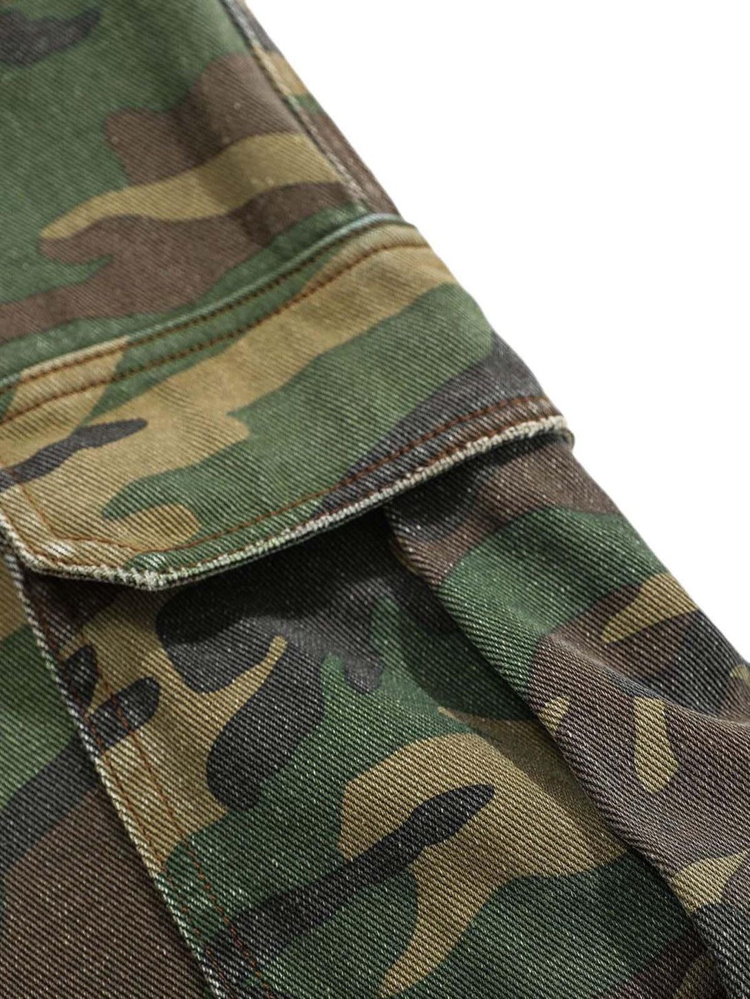 A tight crop highlighting the rugged pocket design on TALISHKO camouflage cargo pants.