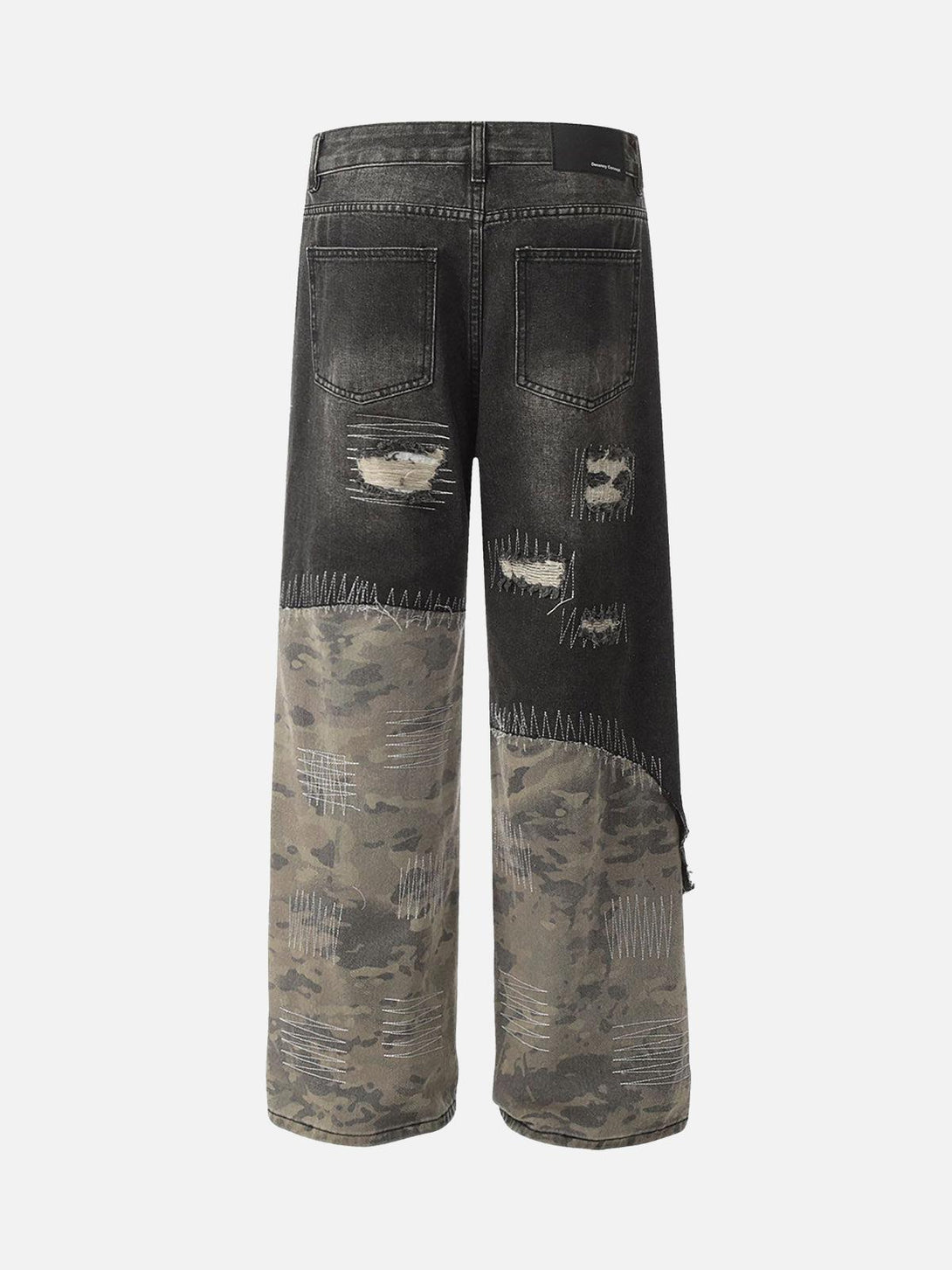 Back view of TALISHKO's baggy jeans with distressed camouflage patchwork accents.