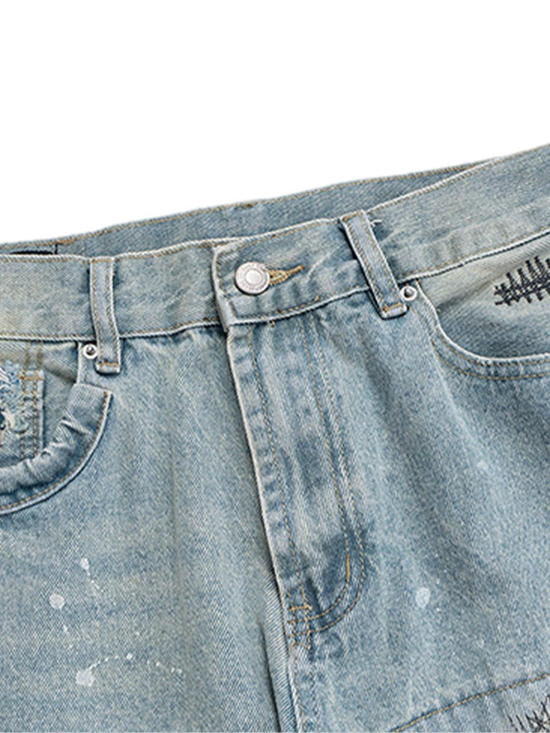 Detailed fabric and stitching on TALISHKO's baggy flare jeans, featuring a distressed design.
