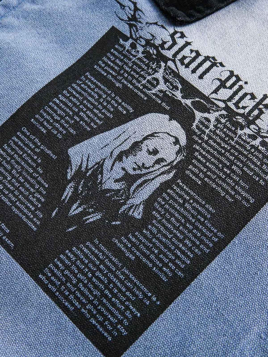 Intricate look at the printed design on a TALISHKO denim jacket, highlighting unique details.