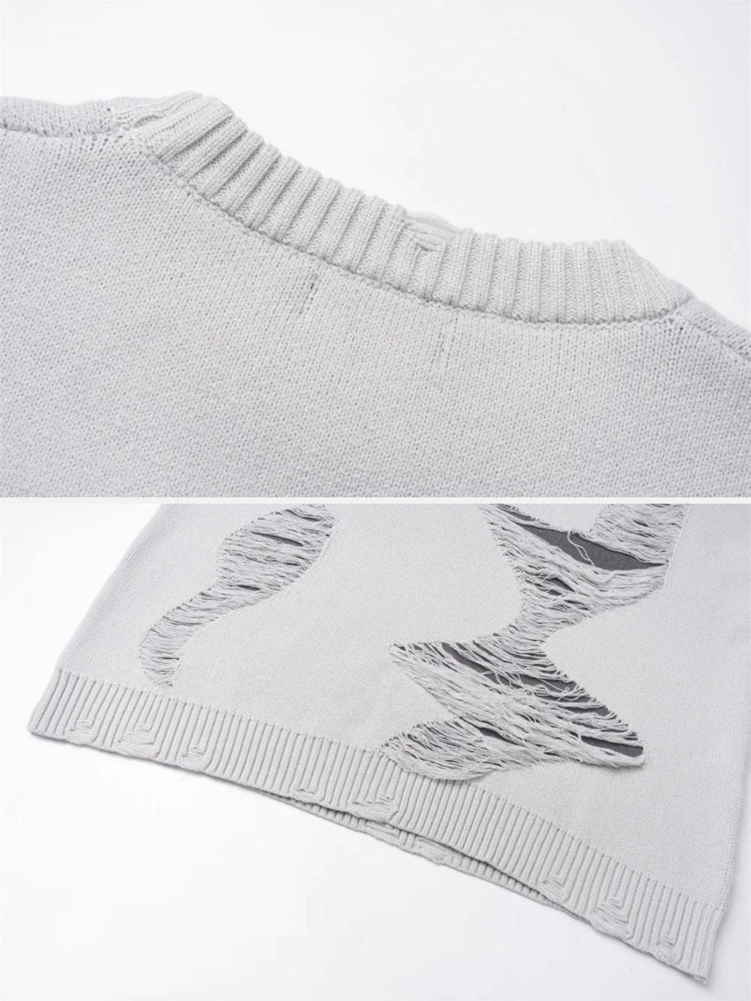 Intricate look at TALISHKO's gray ripped knit sweater, emphasizing its unique distressed details.
