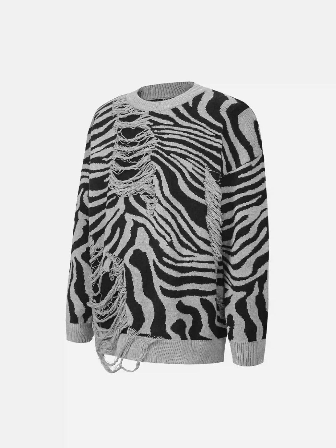 A stylish TALISHKO zebra-pattern sweater with ripped details, showcasing a bold, edgy look.