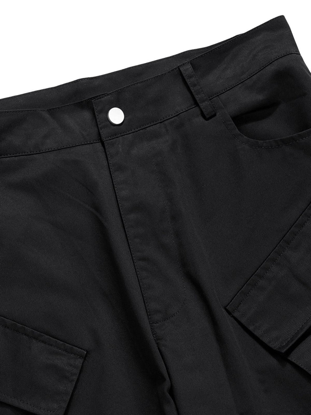 A close-up of TALISHKO cargo pants featuring a sleek snap closure and functional pockets.