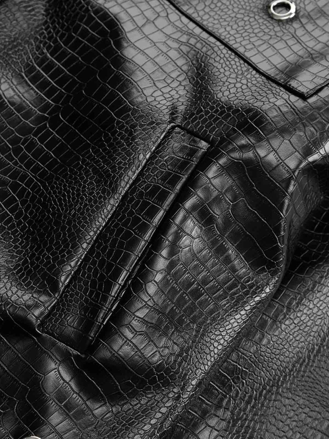 Texture and pattern showcased in TALISHKO's shoulder pad PU leather jacket, highlighting luxury.