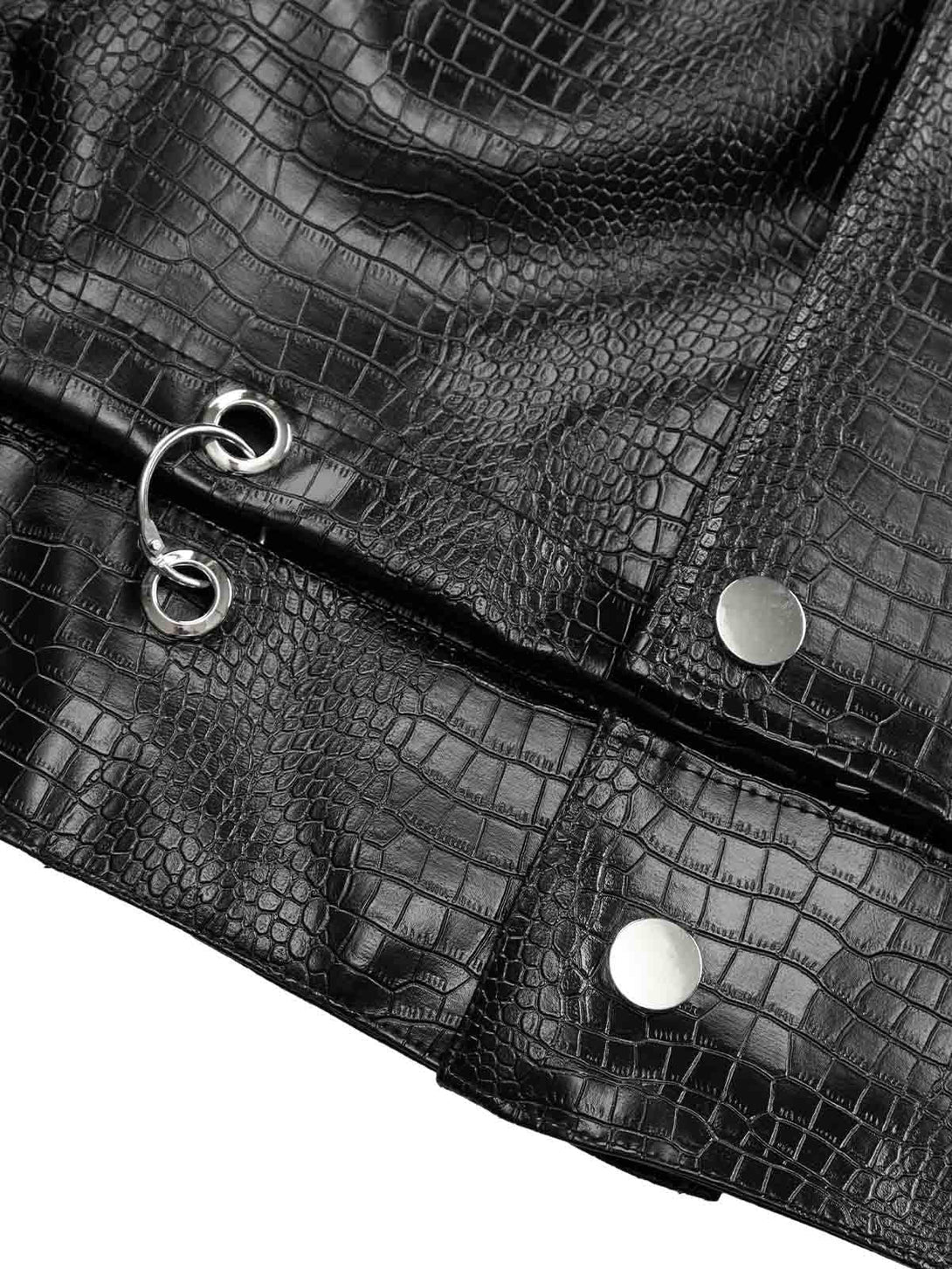 Intricate look at TALISHKO's shoulder pad PU leather jacket, emphasizing its textured details.