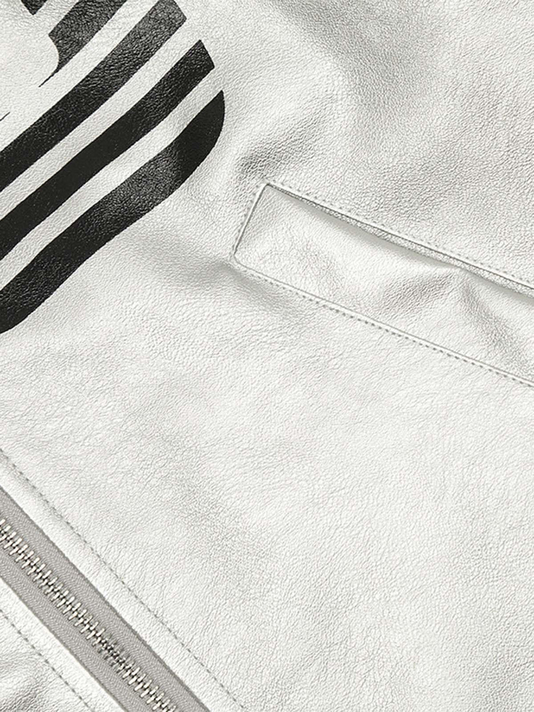 Intricate look at the silver leather texture on TALISHKO's motorcycle hooded jacket.