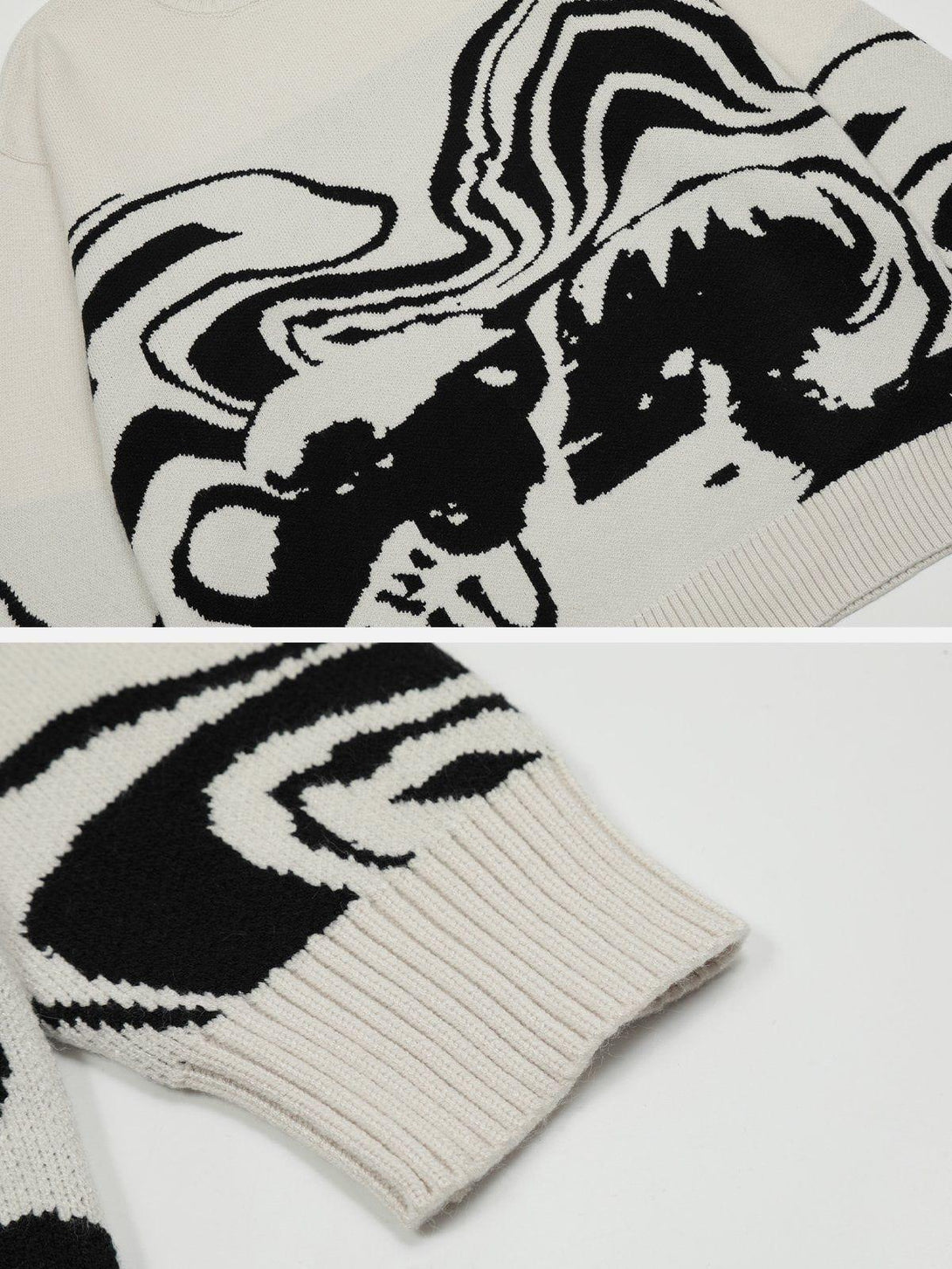 A detailed view of the TALISHKO sweater's abstract black and white pattern and ribbed cuff.