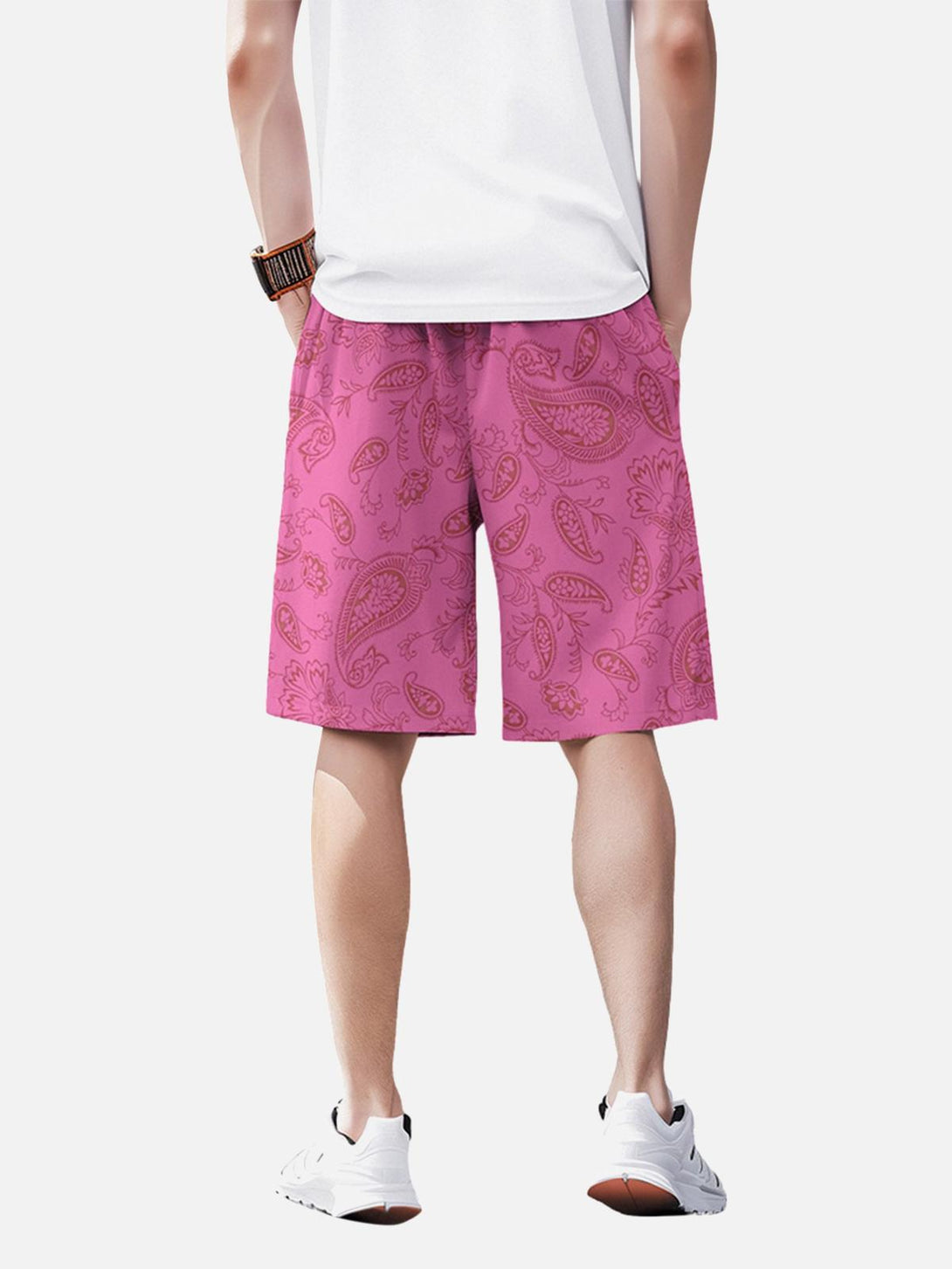 Back view of TALISHKO pink shorts with paisley print, styled for a relaxed summer vibe.