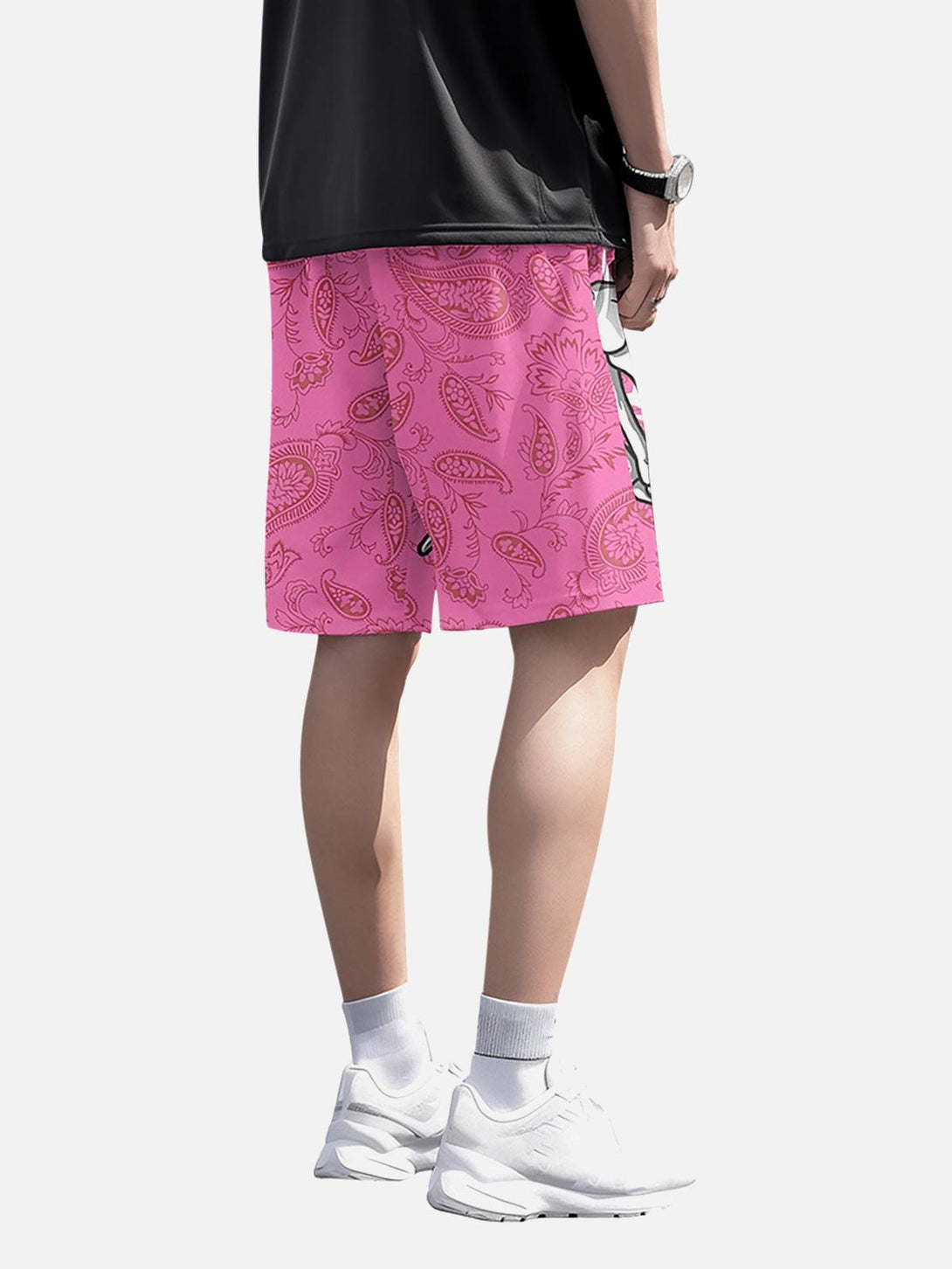 Back view of pink hip-hop shorts by TALISHKO, featuring a paisley pattern and relaxed fit.