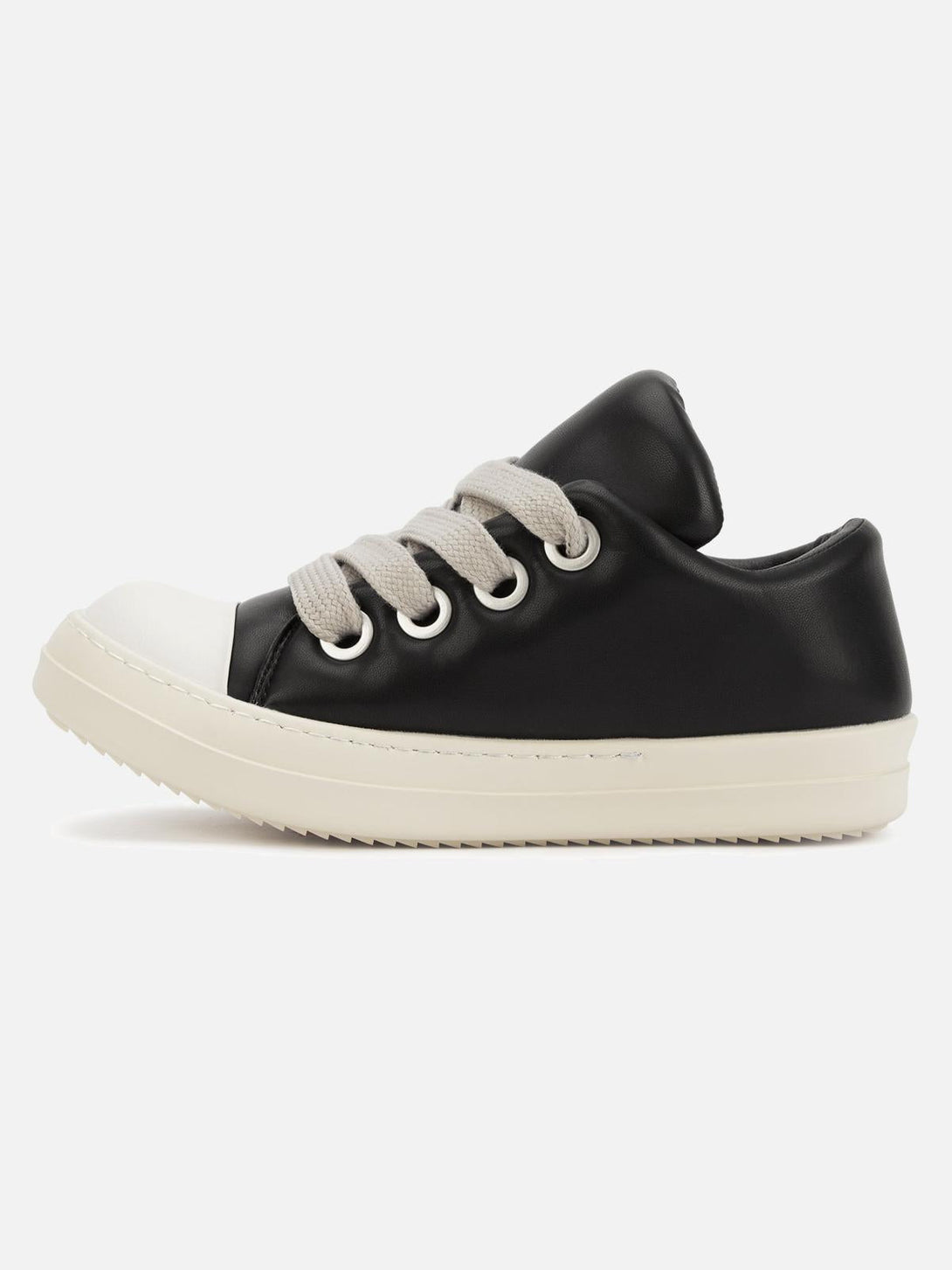 TALISHKO slip-on sneakers with wide laces and a black and white contrast, ideal for urban fashion.