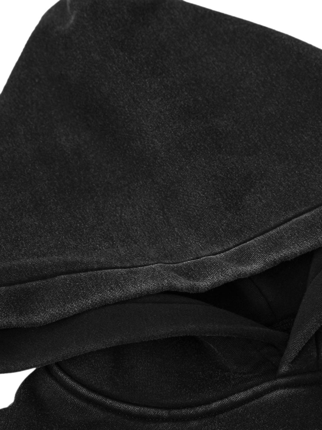 Detailed fabric and stitching of the smudge-dyed hoodie by TALISHKO, showcasing its texture.