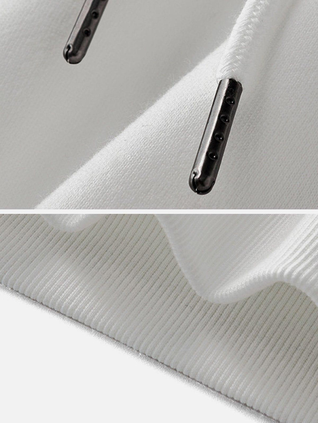 Detailed fabric and drawstring of a white hoodie by TALISHKO, showcasing sleek design elements.