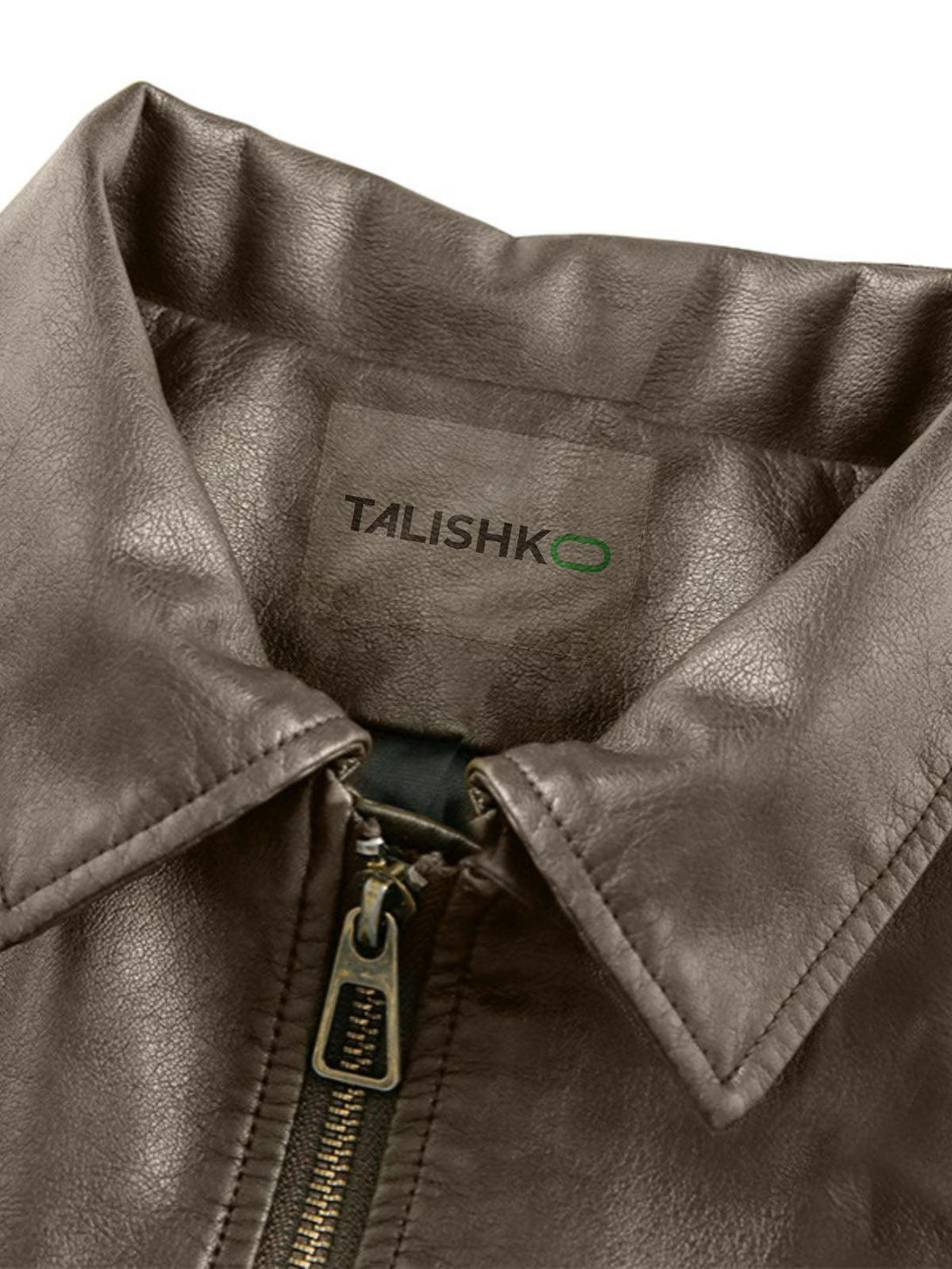 Detailed view of TALISHKO faux leather jacket collar and zipper, highlighting craftsmanship.