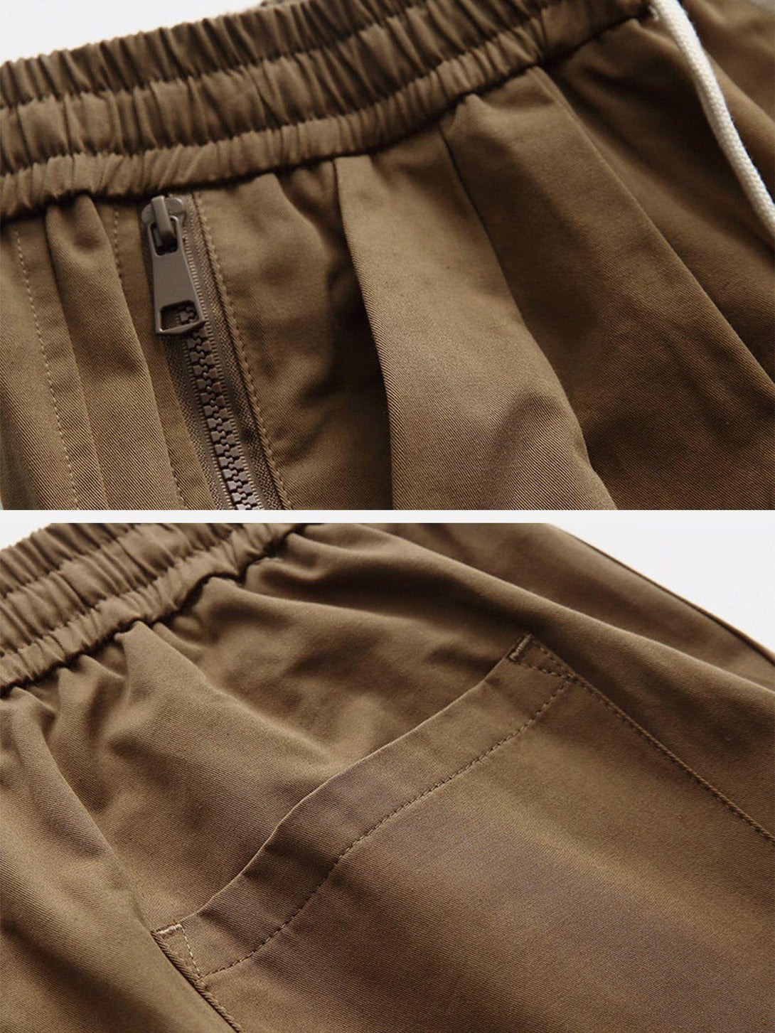 Intricate look at TALISHKO khaki shorts with zip-up pockets, showcasing a relaxed fit.